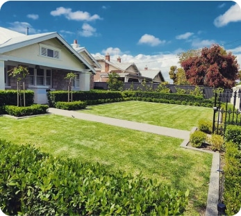 Landscape installation with professionally designed garden features and pathways