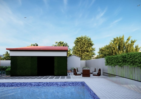 Pool area surrounded by lush greenery and elegant landscape design